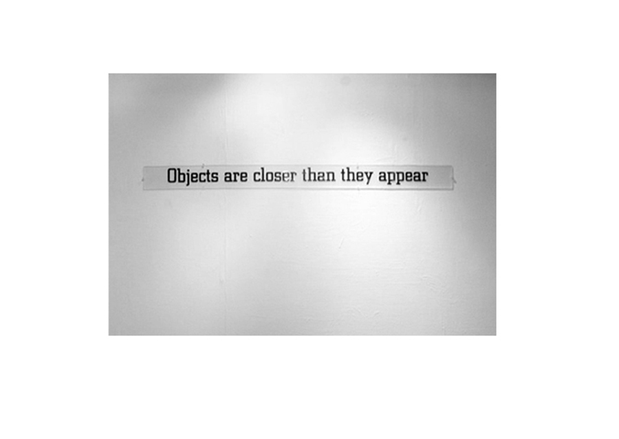 Alejandro Fournier,“Objects are closer than they appear“, vinil sobre espejo, 10 x 30 cms., 2006